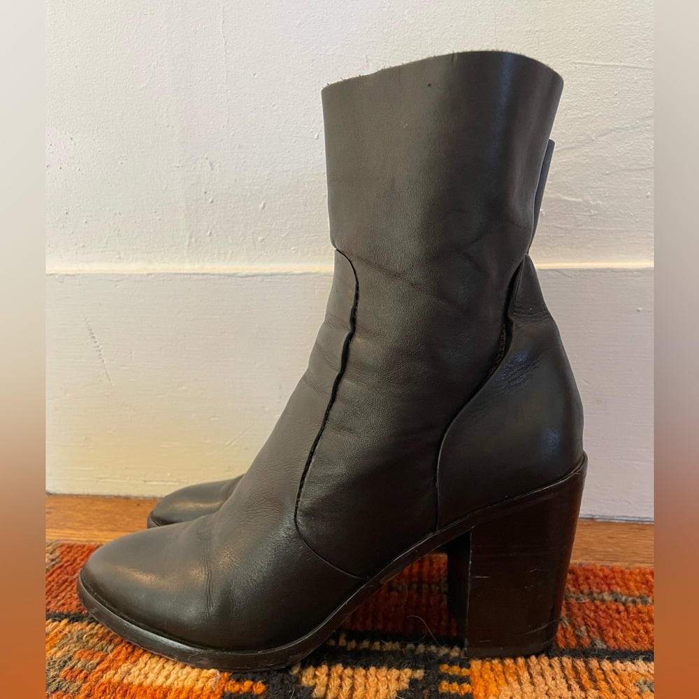 Black healed leather boots